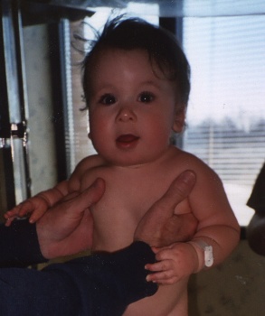 This was taken while Cody was in the hospital for pneumonia.  I thought he looked angelic in this picture.  .  February 2003