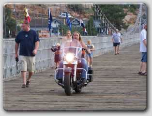 me riding across the wooden planked Royal Gorge bridge
