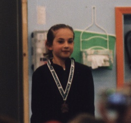 Harlee on the podium at her first ever USAG sanctioned meet, taking 3rd place on floor.
