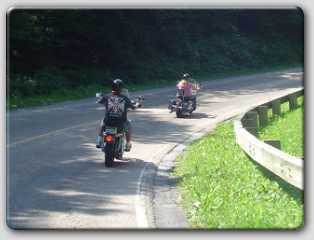 Mom hung out the window of the van to get some shots of Eric and I riding in the mountains.